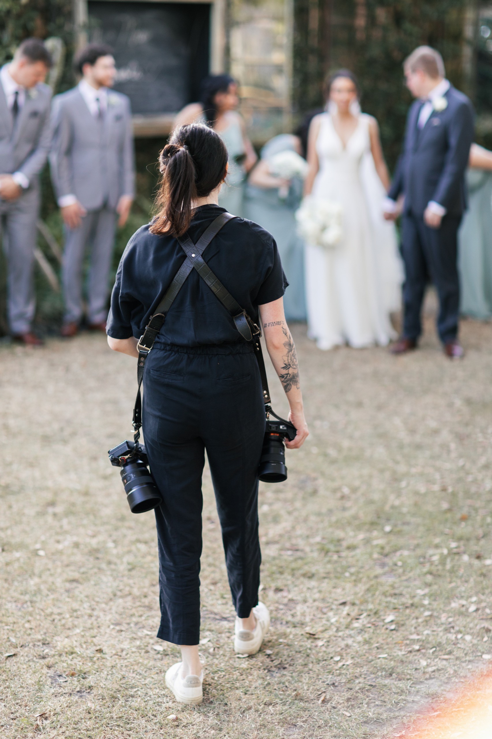 Casey Helfrich photographing a couple on their wedding day