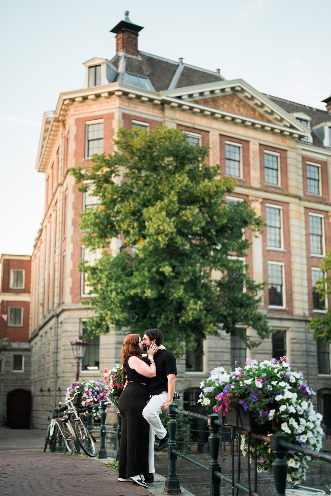 Suzie and Carlos in a soft-light Amsterdam frame