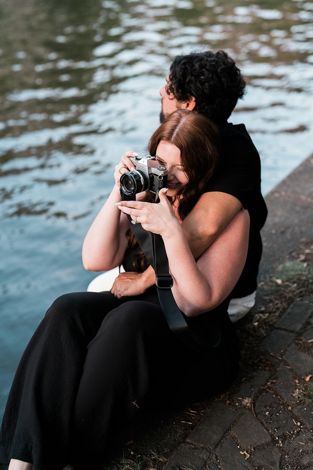 Quiet candid moment on an Amsterdam canal bridge