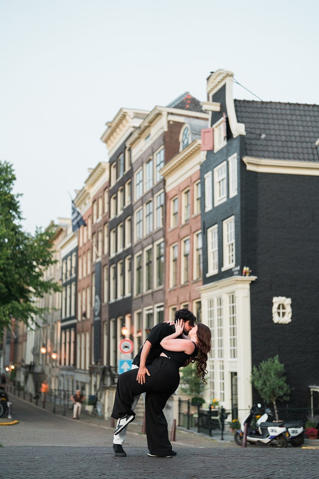 Couple portrait on a cobbled Amsterdam street