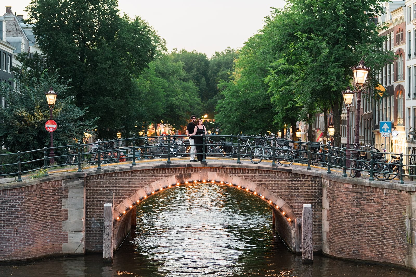 Low-light Amsterdam couple portrait at dusk